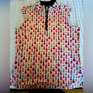 SanSoleil  golf shirt. Cute cap sleeves. Wine bottles. Size large
